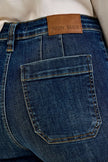 Dark indigo durable cotton-blend utility jeans with patch pocket, high waist, elongating wide crop fit