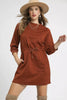 Rust orange cable-knit mini dress with drawstring waist and front pockets