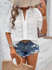 side view of white eyelet blouse showing semi-sheer fabric and flounce sleeves