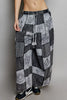 Grey and black patchwork wide leg drawstring pants with bohemian printed fabric texture