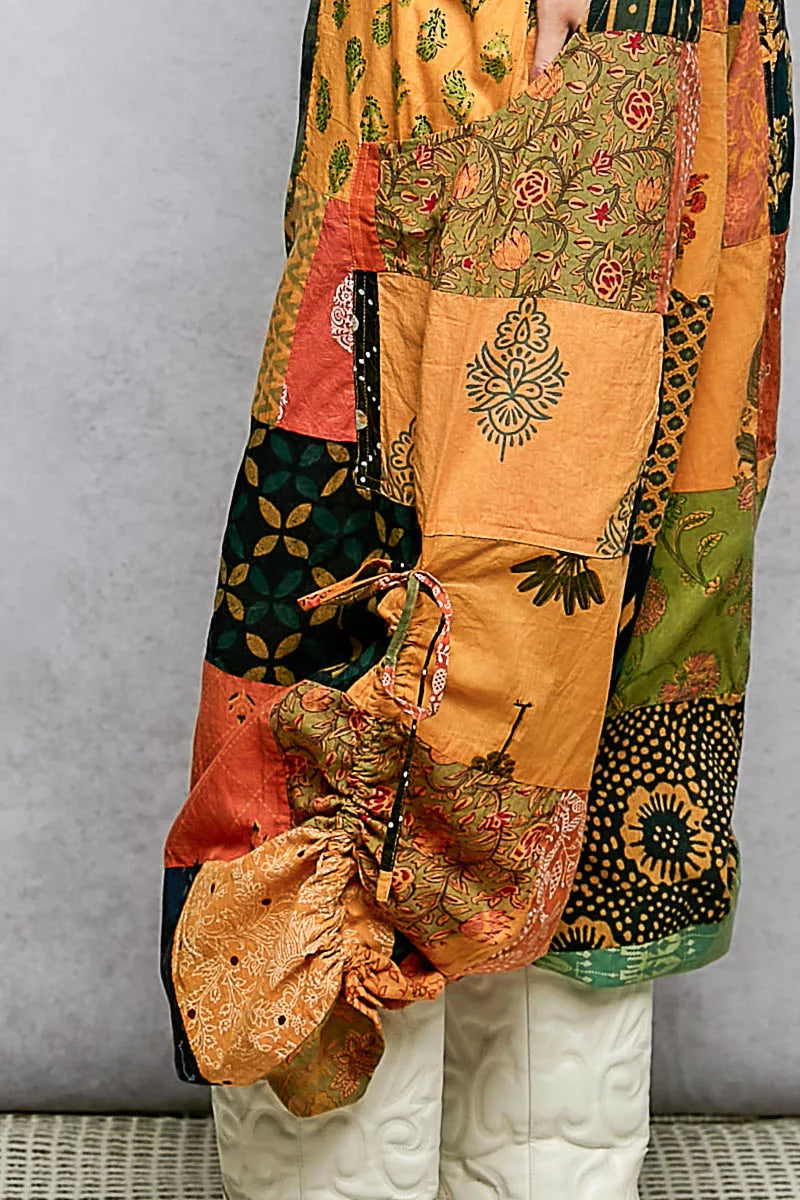 Multicolor bohemian patchwork wide leg pants with floral prints and adjustable drawstring waist