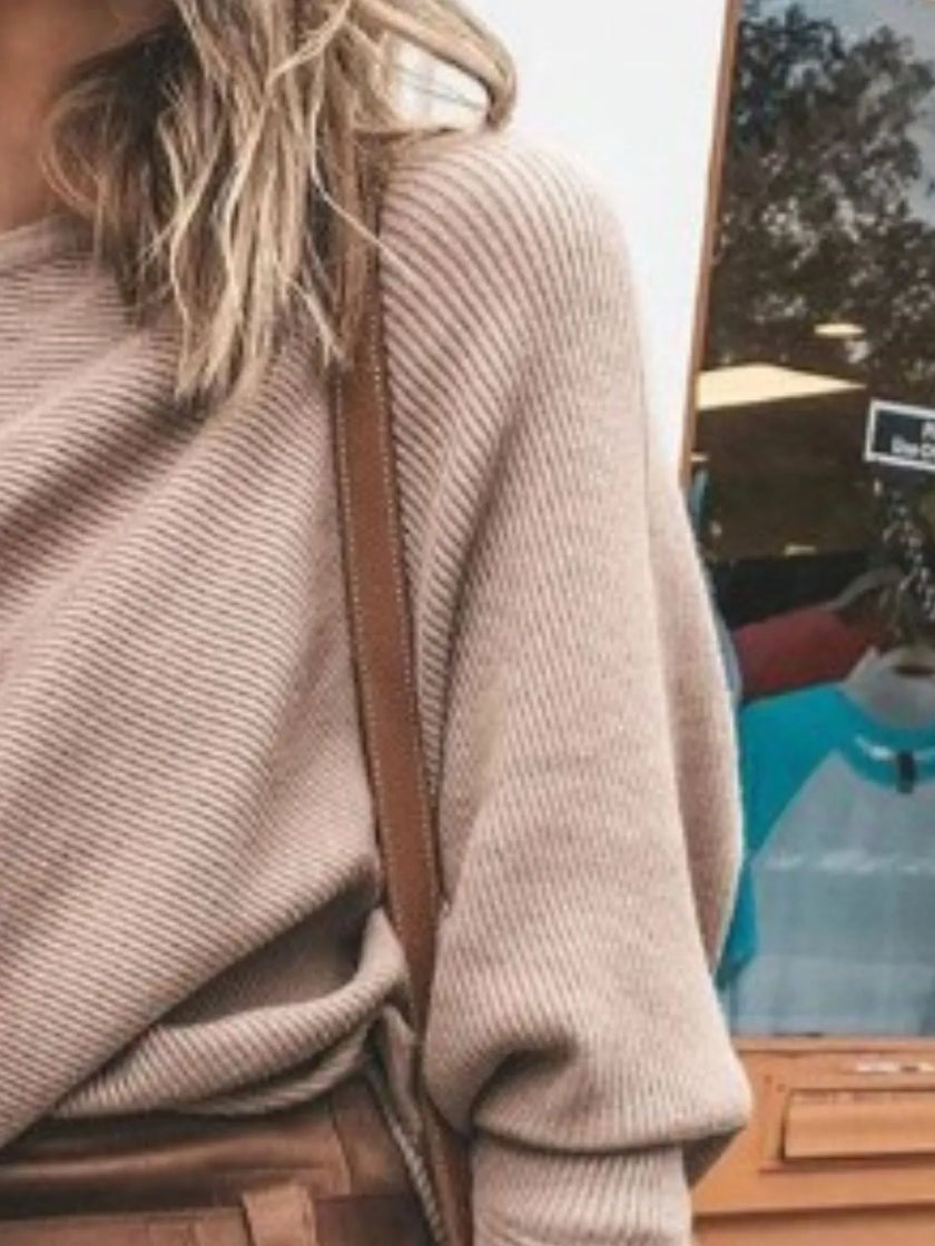 Detail of ribbed knit fabric on oversized relaxed fit top