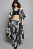 Grey and black patchwork wide leg drawstring pants with bohemian floral print patterns