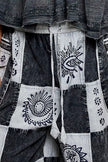 High-rise grey and black patchwork joggers with Aztec prints and drawstring waist