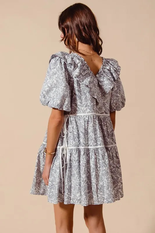 Gray and white floral cotton dress with ruffled sleeves and V neckline side tie