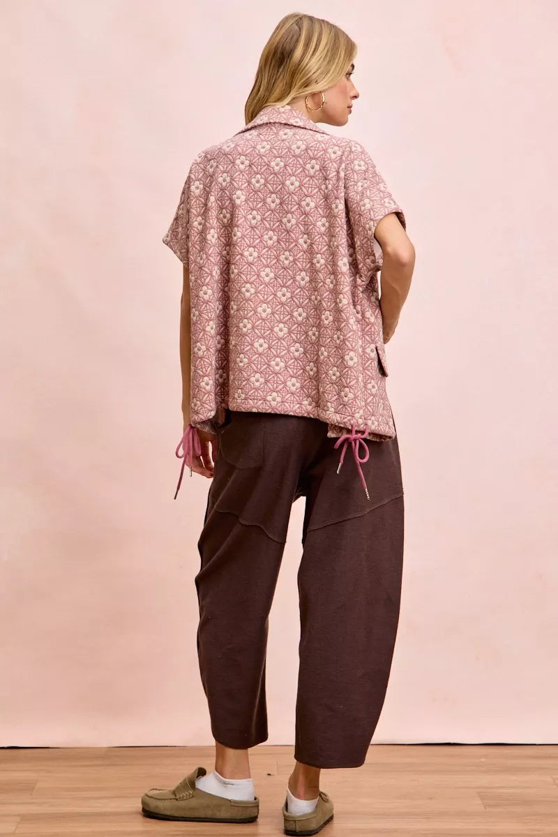 Close-up of terry fabric texture on mocha brown pants
