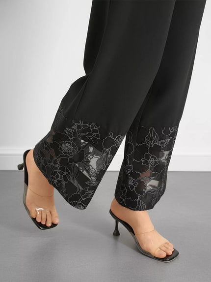 High-rise lace hem wide leg pants displayed on mannequin