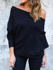 Close-up of ribbed knit texture and off-shoulder neckline detail