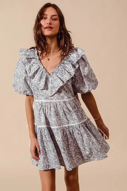 Gray and white floral cotton dress with ruffled V-neck and side tie waist