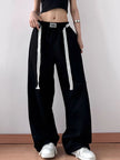 Detail of elastic waistband on relaxed fit pants